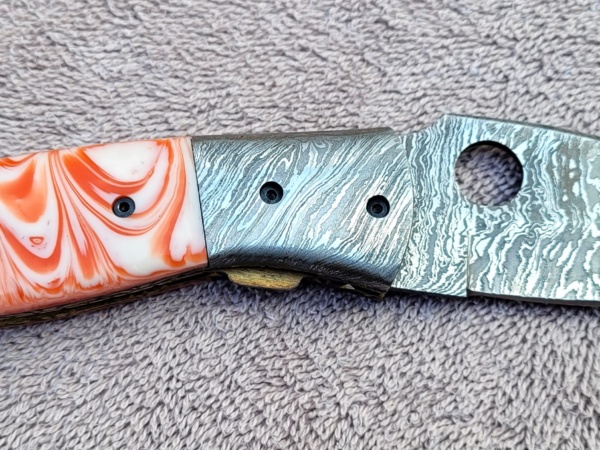 Folder w/Orange & White Resin Handle